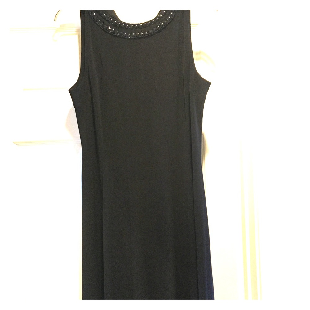 Kinda fancy kinda casual. Easy to wear LBD.